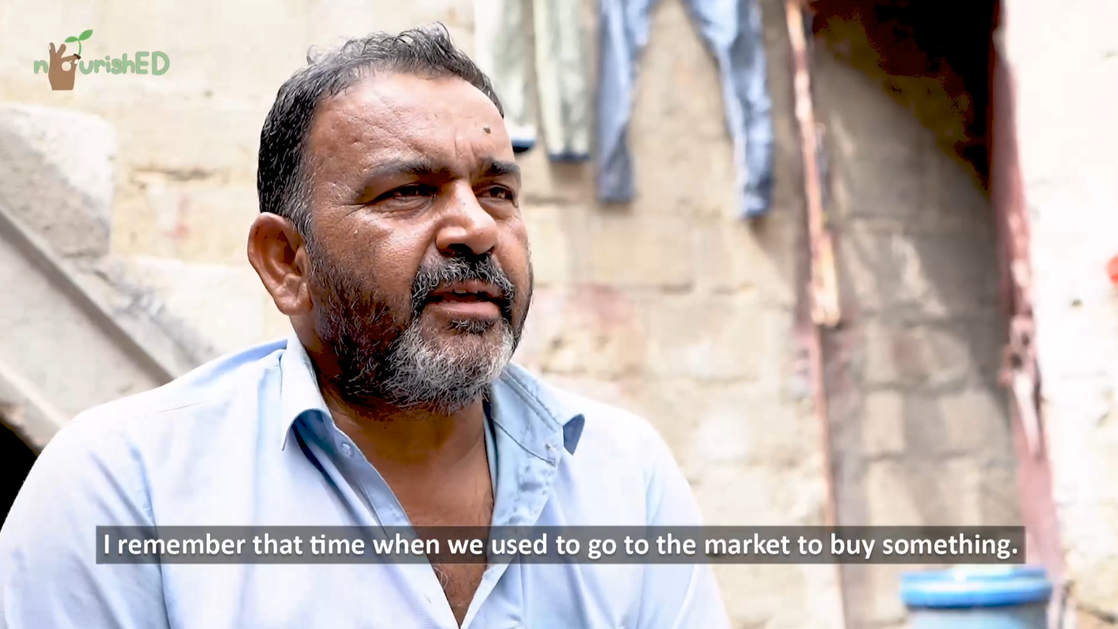A father speaking about the Nourished meal program at the Library of Ibrahim Goth