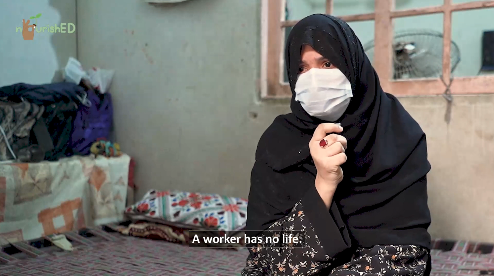 A mother speaking about the Nourished meal program at the Library of Ibrahim Goth